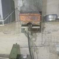 و سرویس آبگرمکن دیواری وبازکردن لوله خروجی|خدمات پیشه و مهارت|مشکین‌دشت, |دیوار