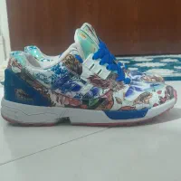 یک جفت کفش ZX آدیداس دراگون نو