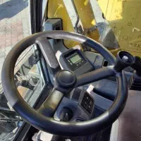 بیل مکانیکی لاستیکی نیوهلند MH|خودرو سنگین|شبستر, |دیوار