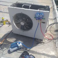 کولر سازی نصب و گاز گیری کولر پنجره ای دوتیکه