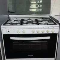 اجاق گاز ۵ شعله فردار و جوجه گردان سینجر