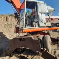 بیل مکانیکی پوکلین۹۰