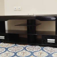 زیر تلوزیون شیشه ای بدون خط خش