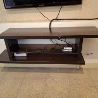 یک عدد زیر تلویزیون دیواری MDF در حد نو