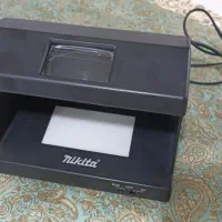 دستگاه تشخیص اصالت اسکناس،تراول