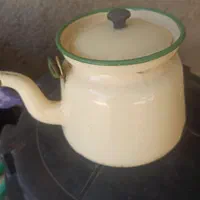 فروش کتری لعابی و ساعت