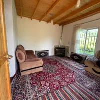 کلبه سوئدی جنگلی راشا|اجارهٔ کوتاه‌مدت ویلا و باغ|زیرآب, |دیوار