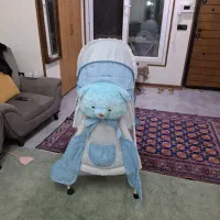 گهواره کنار تخت مادر