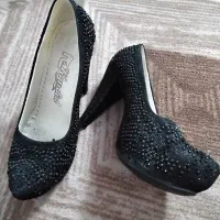 کفش مجلسی|کیف، کفش، کمربند|قم, وادی السلام|دیوار