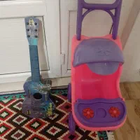 کالسکه وگیتار بن تن هردو باهم پانصد هزار تومان