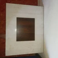 یه عدد منقل شکیل ویه عدد میز.