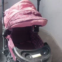 کالسکه و کریروآغوش بندومبل و راکرکودک