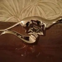 مجسمه دایناسور سرامیک با آبکاری نقره ای آکبند