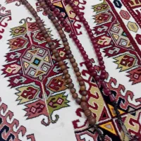 تسبیح هسته خرما کار زندان گرگان