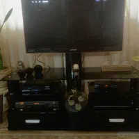 میز تلویزیون شیشه ای سالم و نو