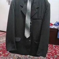 یه دست و کت و شلوار و کروات