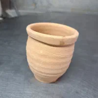 کوزه سفالی ماست