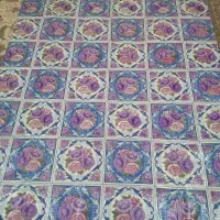 سفره قدیمی ظخیم پشتش پارچه ای