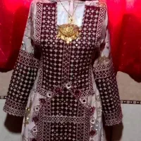 خیاطی لباس زنانه بلوچی و دوخت آیینه روی لباس