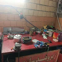 یک باب مغازه با تمام ابزار زیر بند سازی