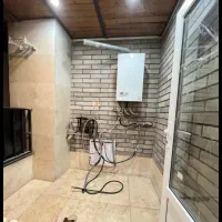 این خونه ب تراس بزرگش میرزه