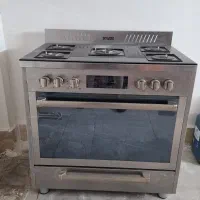 اجاق گاز و فر صفحه شیشه ای در حد نو ایتالیایی