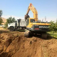 کمرشکن و بیل مکانیکی خاکبرداری تخریب