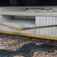 میز تلویزیون در حد نو تمیز یکماه خرید کردم