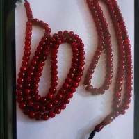 دو تسبیح کهربا زرشکی