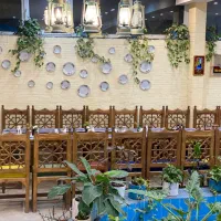 کار در رستورارن منقلدار با زغال