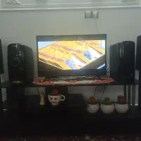 تلویزیون.میز . سینما خانگی .