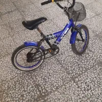 دوچرخه ۱۶ درحد نو به همراه پشتی