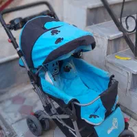 دو عدد کالسکه آبی و صورتی و دو تا روروک