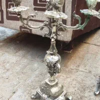 یک جفت شمعدانی  برنج بفروش می‌رسد