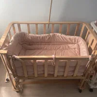 تخت گهواره ای کنار مادر