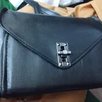 یکسری کفش و لباس و کمد پسرانه
