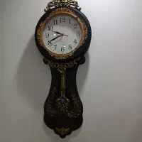 ساعت آونگ دار