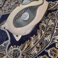 اتو قدیمی. کار میکند