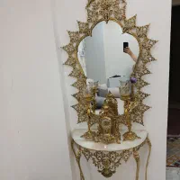 اینه شمعدان و ساعت رومیزی و ساعت دیواری برنجی