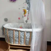 گهواره نوزاد چوبی بیضی آنجل لند