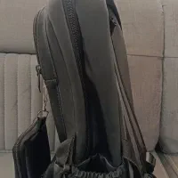 کیف مدرسه|کیف، کفش، کمربند|قم, بنیاد|دیوار