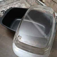 ماهیتابه و مرغ خوری