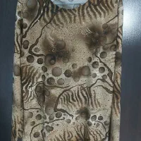تعدادی لباس نو بصورت حراجی