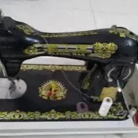 چرخ خیاطی مرد پرنده