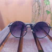 عینک و کمربند و بدلیجات