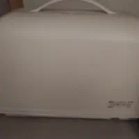 چرخ خیاطی قدیمی مرد پرنده