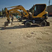 اجاره مینی بیل لاستیکی پاکت و چکش و بابکت