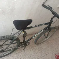 دوعدد دوچرخ یکی کوچیک یکی بزگ