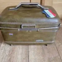 American Tourister vintage hard-shell train