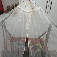 گهواره نوزاد  با  توری برا پشه